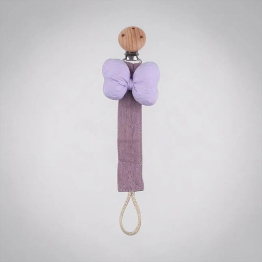 Luxe Bow Dummy Clip in purple with soft fabric strap and wooden clip.