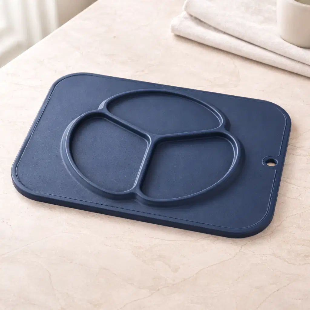 Giggle Bubs baby silicone non-slip plate with three compartments for toddler meals.